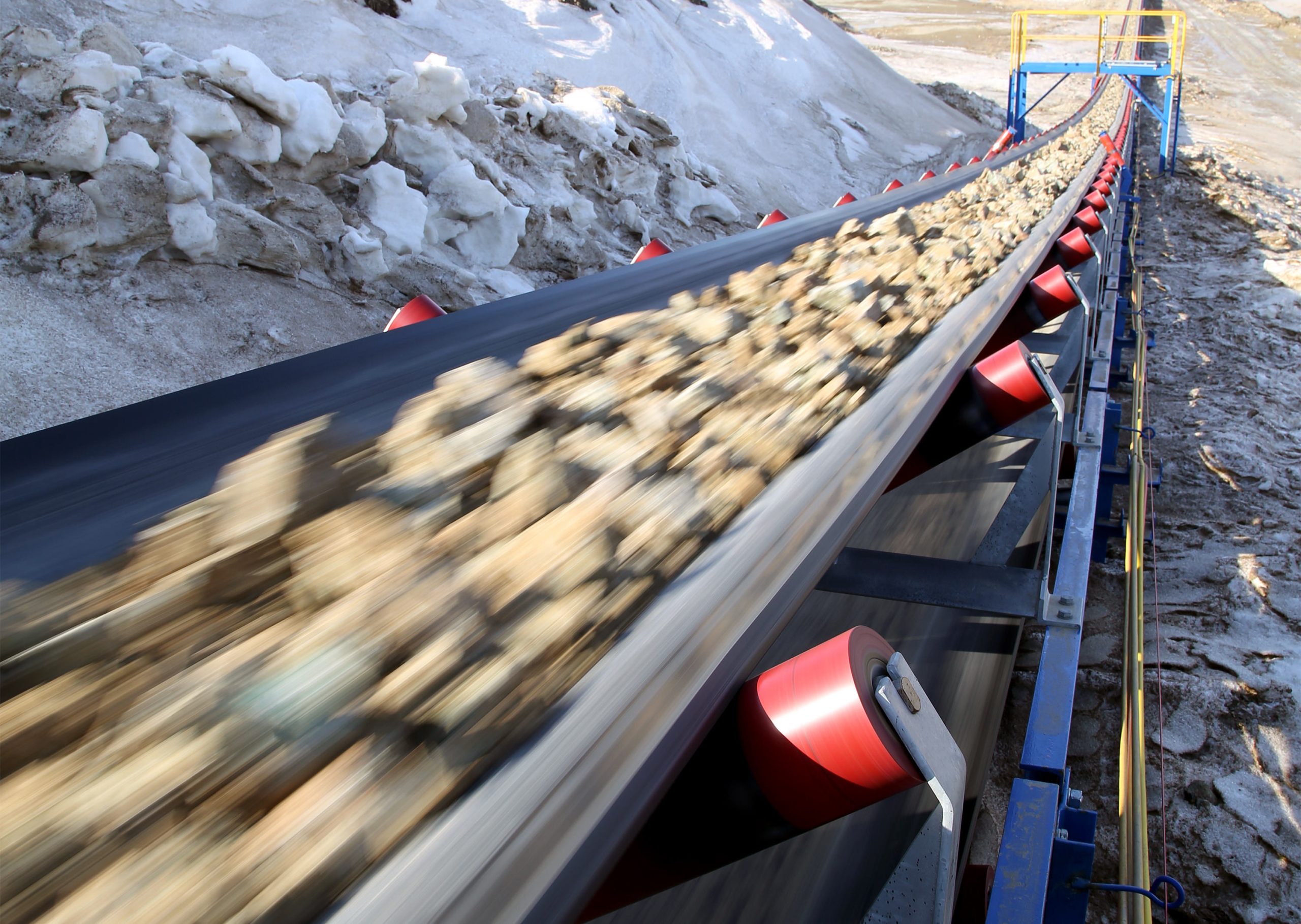 Conveyor,Belt,Moves,Ore,From,The,Quarry,For,Processing.,Blurred